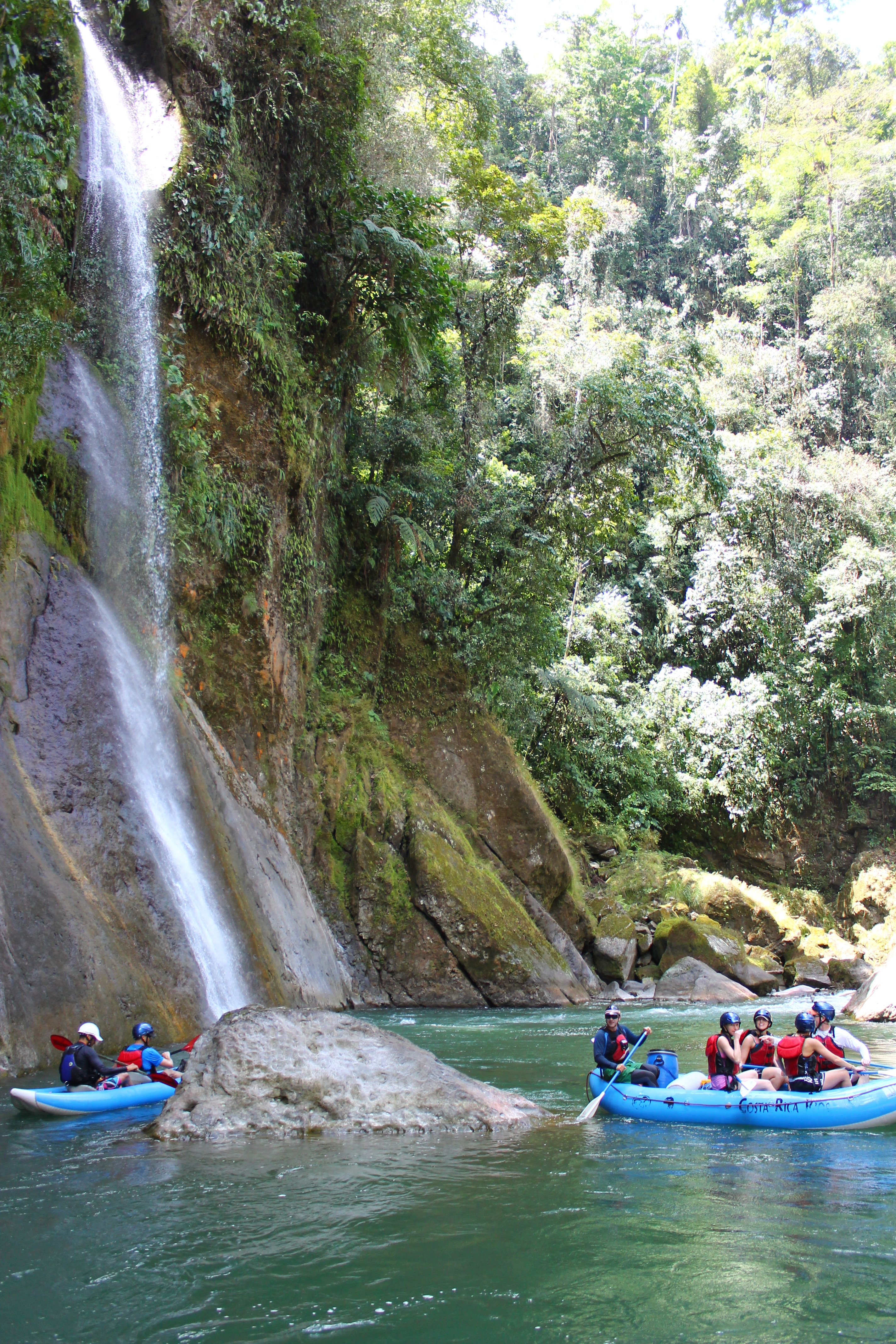 whitewater rafting past waterfalls on the Pacuare River