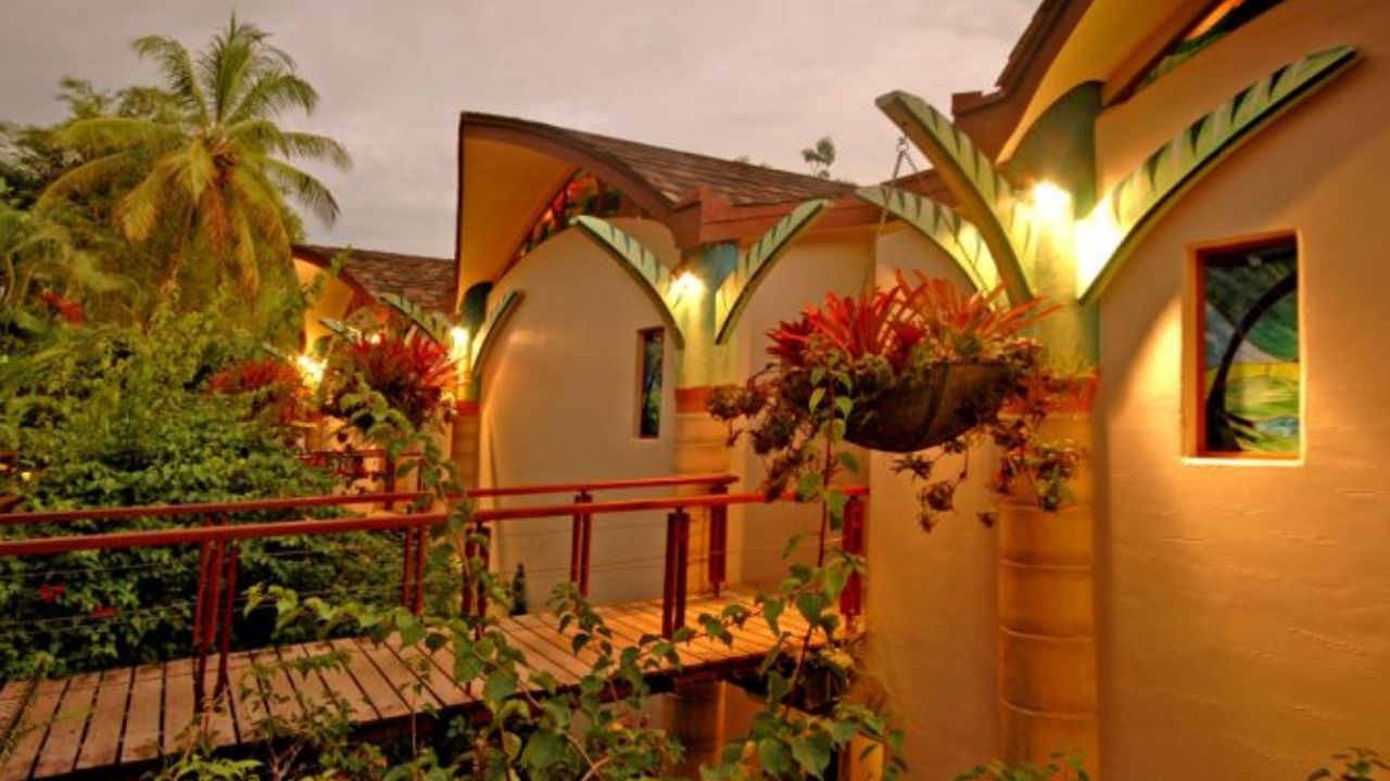 Tropical Costa Rica resort with eco-architecture and lush greenery.