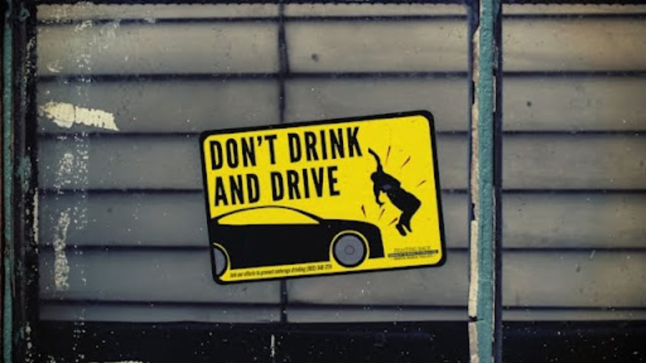 Don't Drink and Drive poster on glass panel