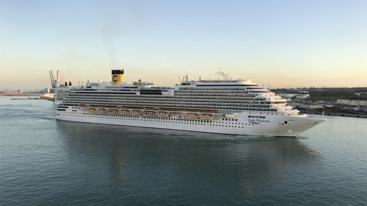 Cruise ship Costa Diadema sailing near Costa Rica port under clear skies.
